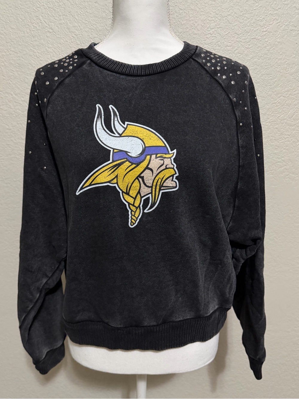 Women's Black Crewneck Sweater with Studded Shoulders and Vikings Logo